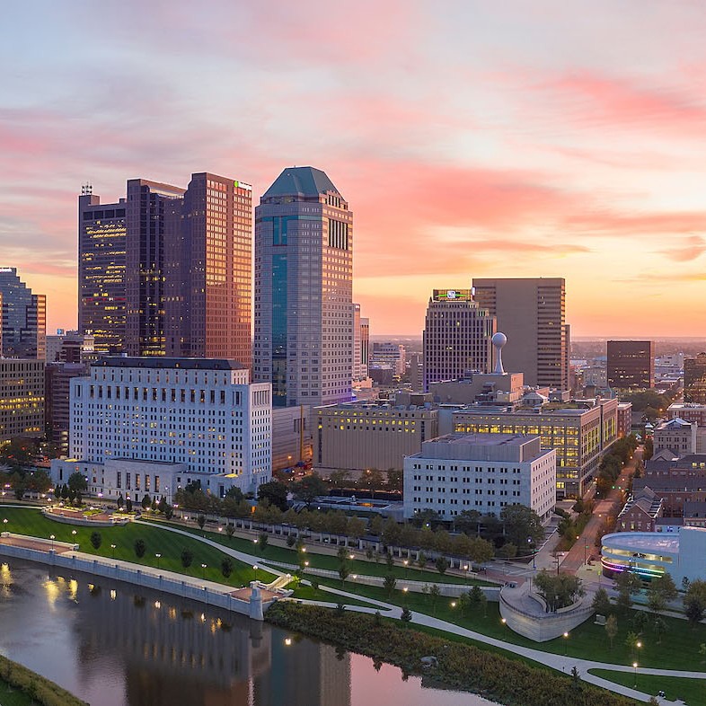 Skyline of Columbus Ohio at dawn with rental properties managed by iTrip